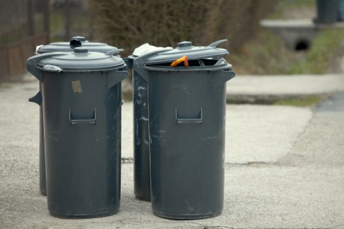 Workers removing garden waste responsibly